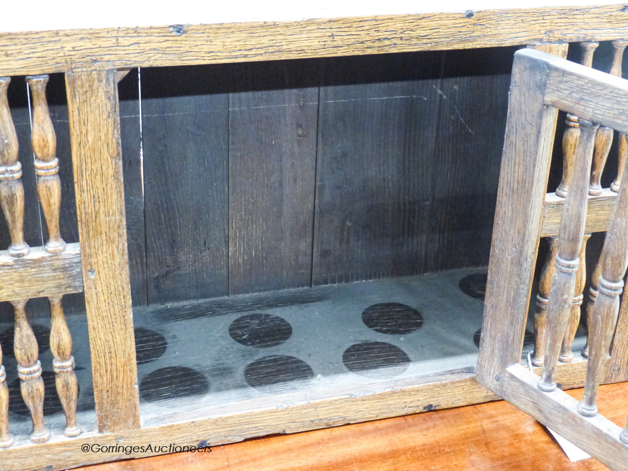 A 17th century style oak hanging food cupboard